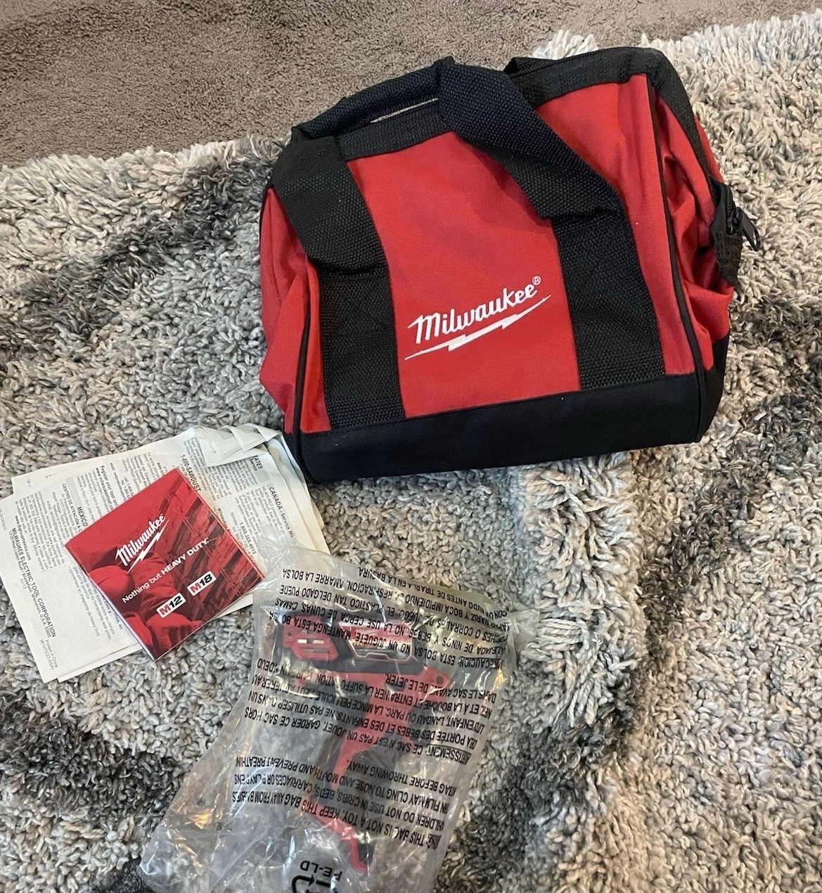 Milwaukee Canvas Tool Bag and 2462-20 m12 1/4” Hex impact Driver